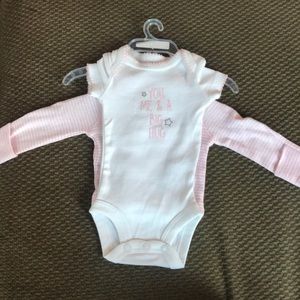 Never worn. Carter’s onesie/sweater. Size: Premie